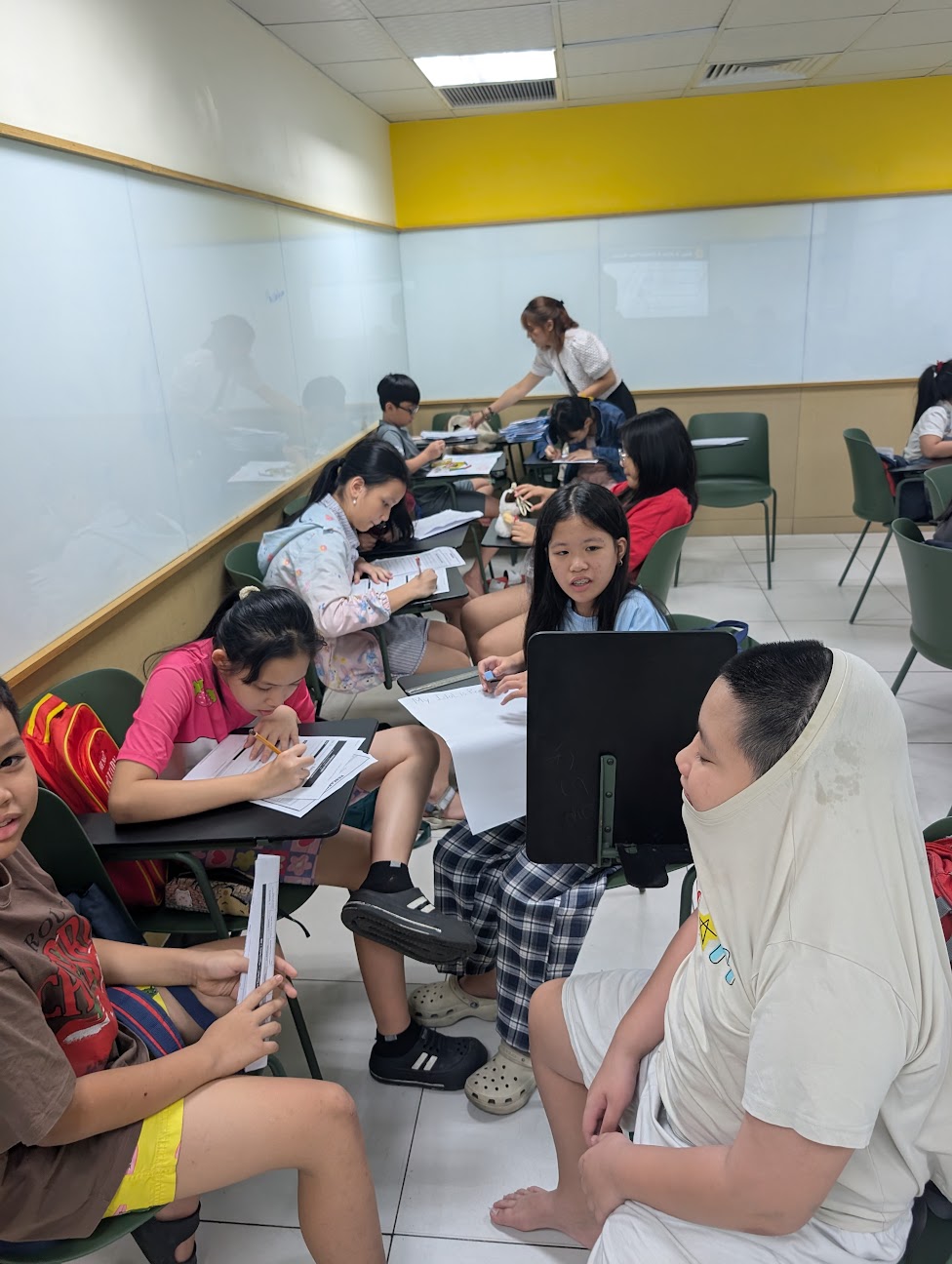 Students working on posters